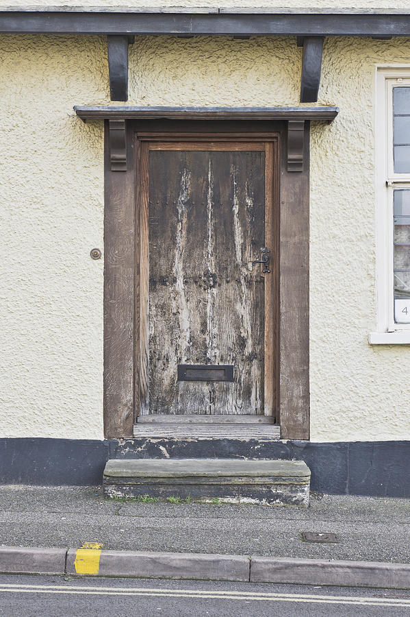Architecture Photograph - Wooden front door by Tom Gowanlock