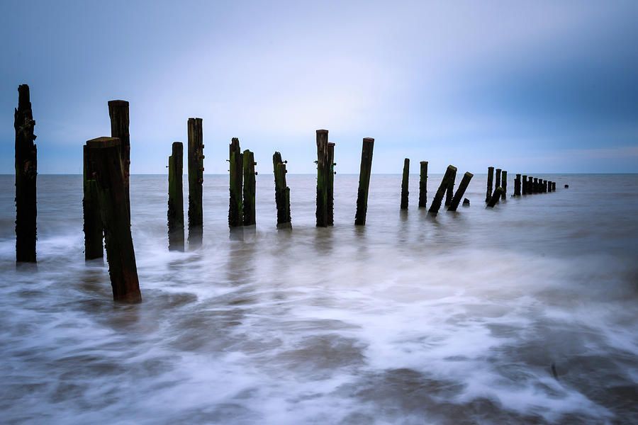 Wooden groynes - 2 Photograph by Chris Smith