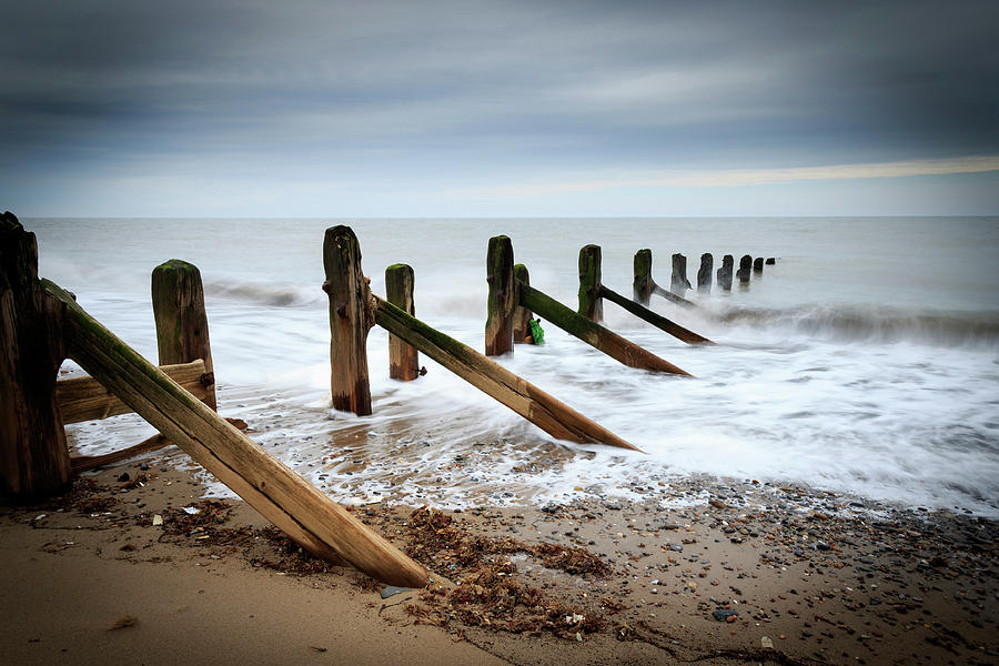 Wooden groynes - 3 Photograph by Chris Smith