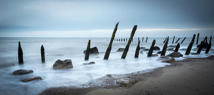 Wooden groynes  Photograph by Chris Smith