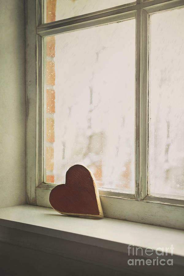 Wooden heart on a window sill Photograph by Sandra Cunningham