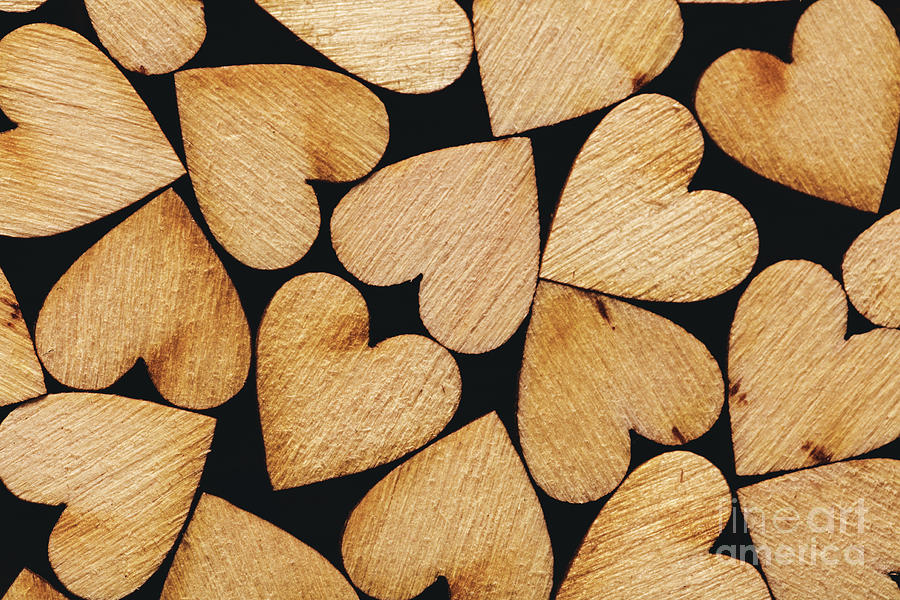 Wooden hearts laying together tightly Photograph by Michal Bednarek