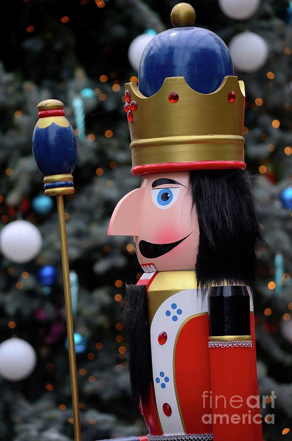 Wooden Nutcracker prince statue in colorful regalia from Christmas fairy tale story Photograph by Imran Ahmed