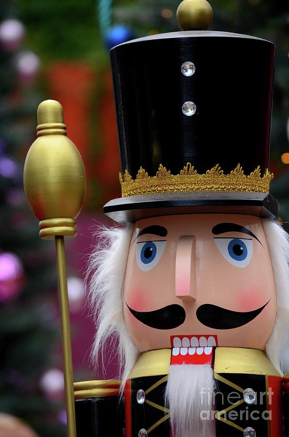 Wooden Nutcracker statue in colorful regalia from Christmas fairy tale story Photograph by Imran Ahmed