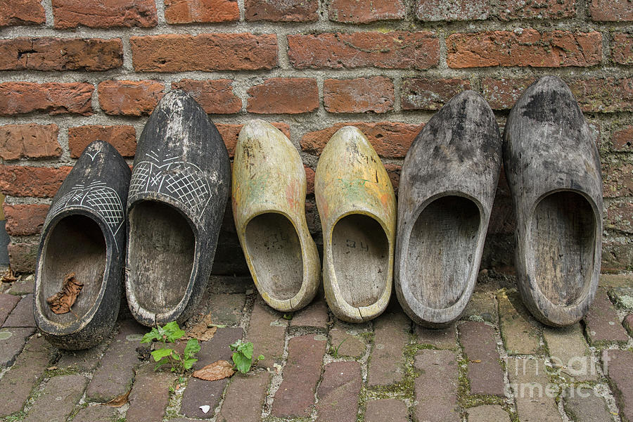 Wooden shoes in a row Photograph by Patricia Hofmeester