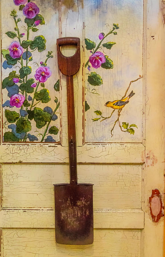 Wooden Shovel On Painted Door Photograph by Garry Gay