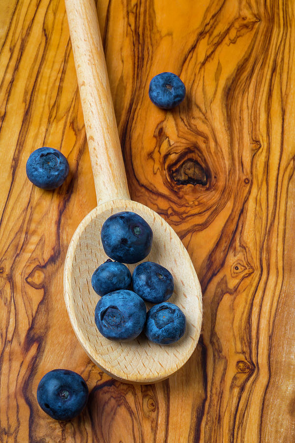 Wooden Spoon And Blueberries Photograph by Garry Gay