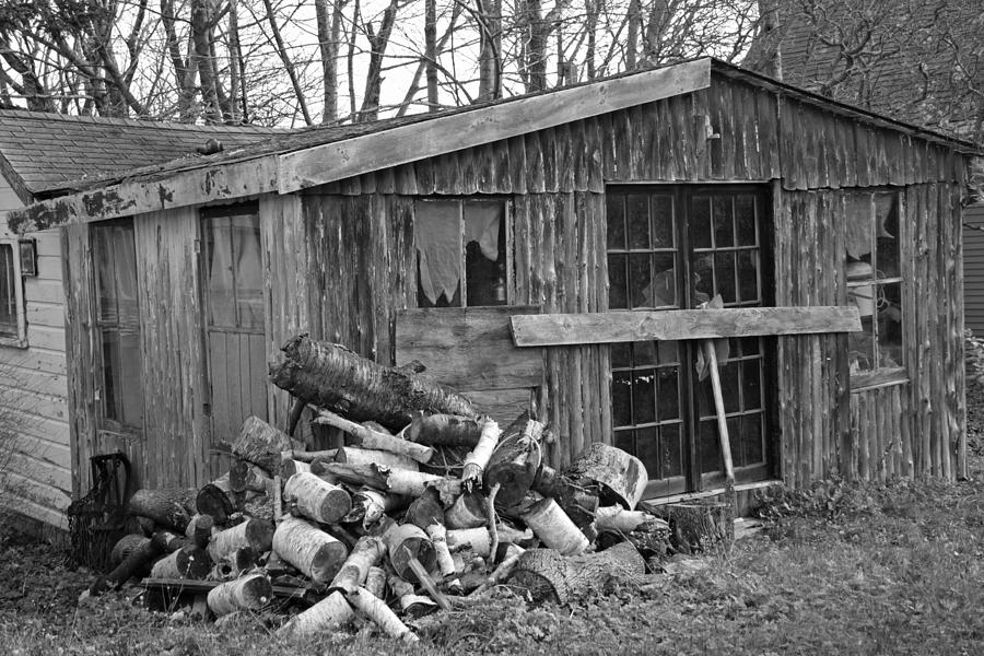 Woodpile And Shed Photograph by Doug Mills