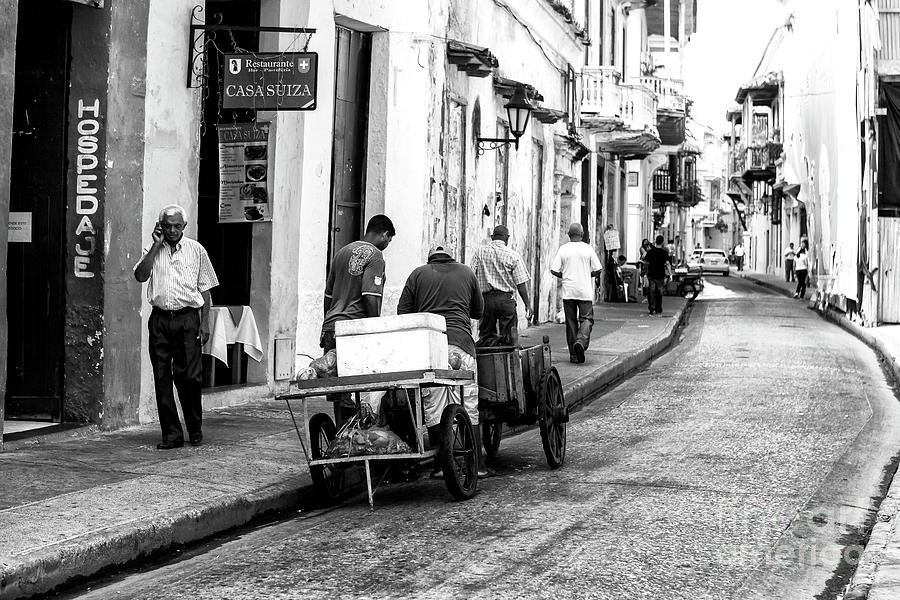 Work Day in Cartagena Photograph by John Rizzuto