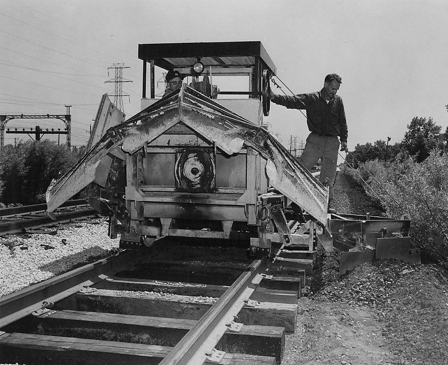 Track Machine Makes Way Down Line - 1957 Photograph by Chicago and North Western Historical Society
