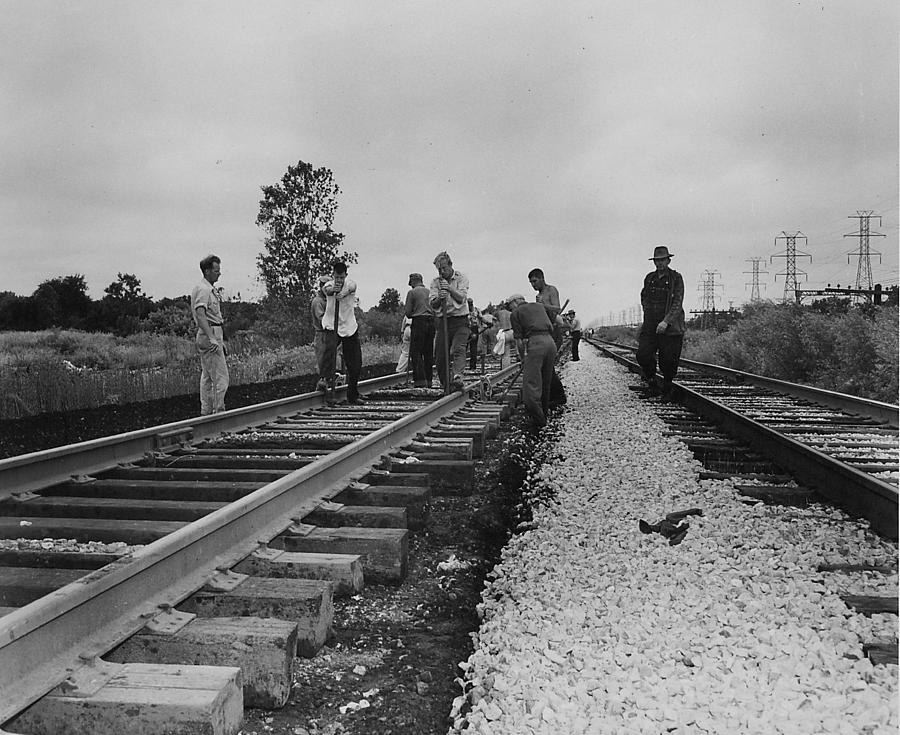 Workers on the Rails - 1957  Photograph by Chicago and North Western Historical Society