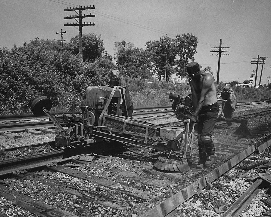 Workers With Track Machine in Countryside Photograph by Chicago and North Western Historical Society