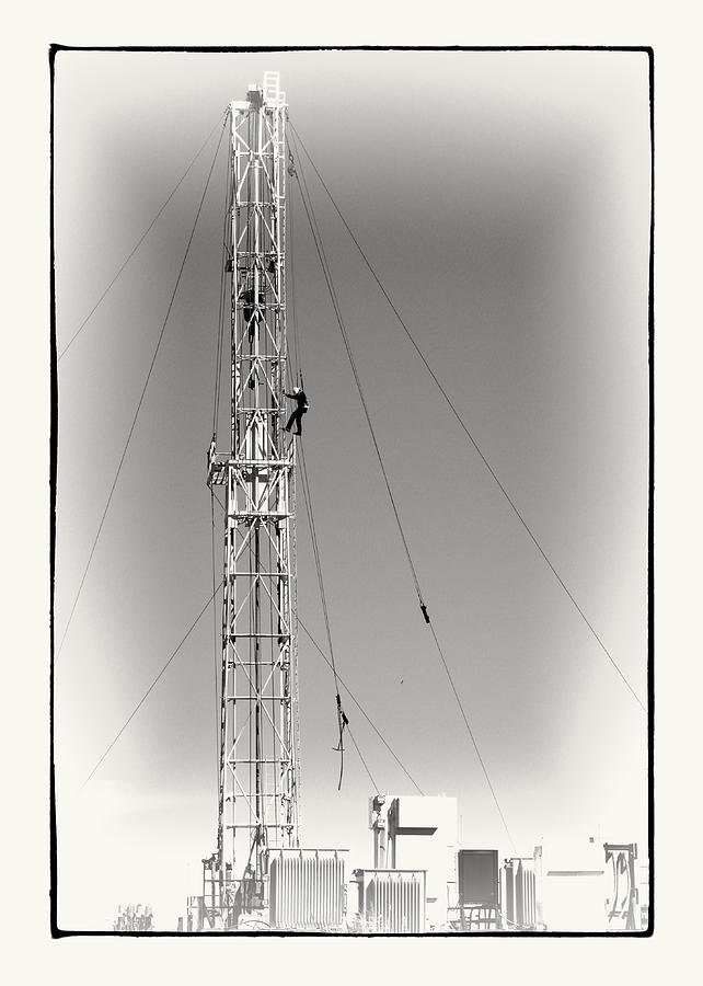 Working On An Oil Derrick  black and white photograph Photograph by Ann Powell