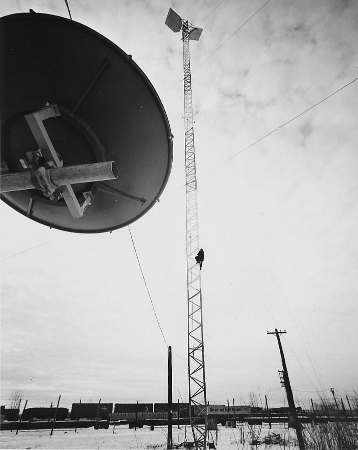 Workman Climbing Antenna Tower Photograph by Chicago and North Western Historical Society