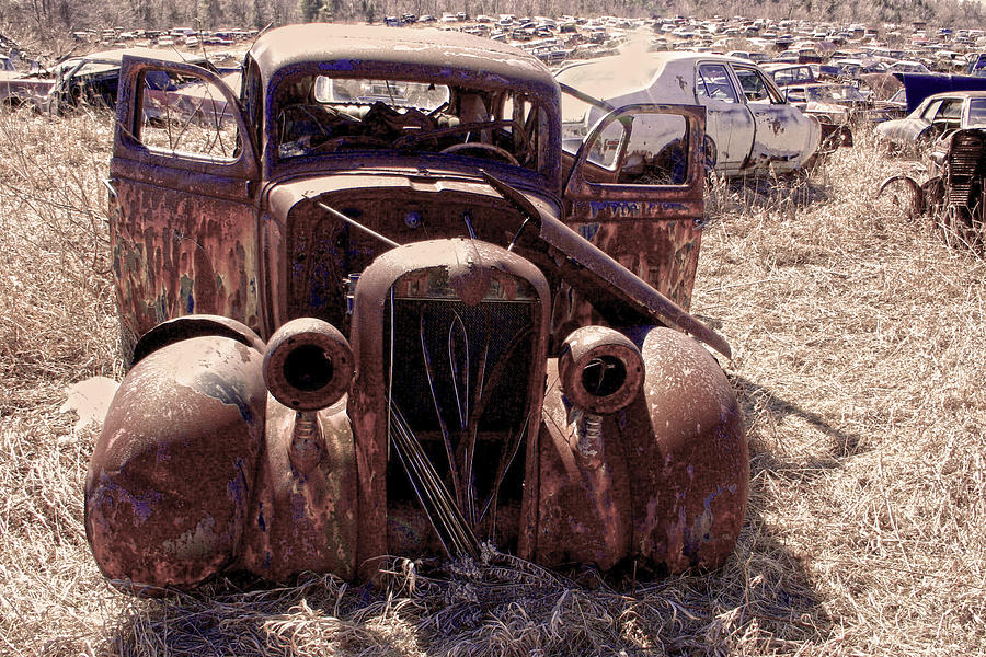 Wrecking Yard Relic Photograph by Jim Vance
