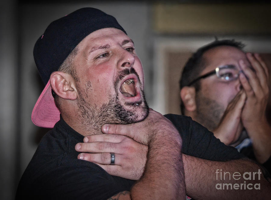 Pro Wrestler Wrestling Personified Rik Luxury Antagonize a Ring Rival  Photograph by Jim Fitzpatrick