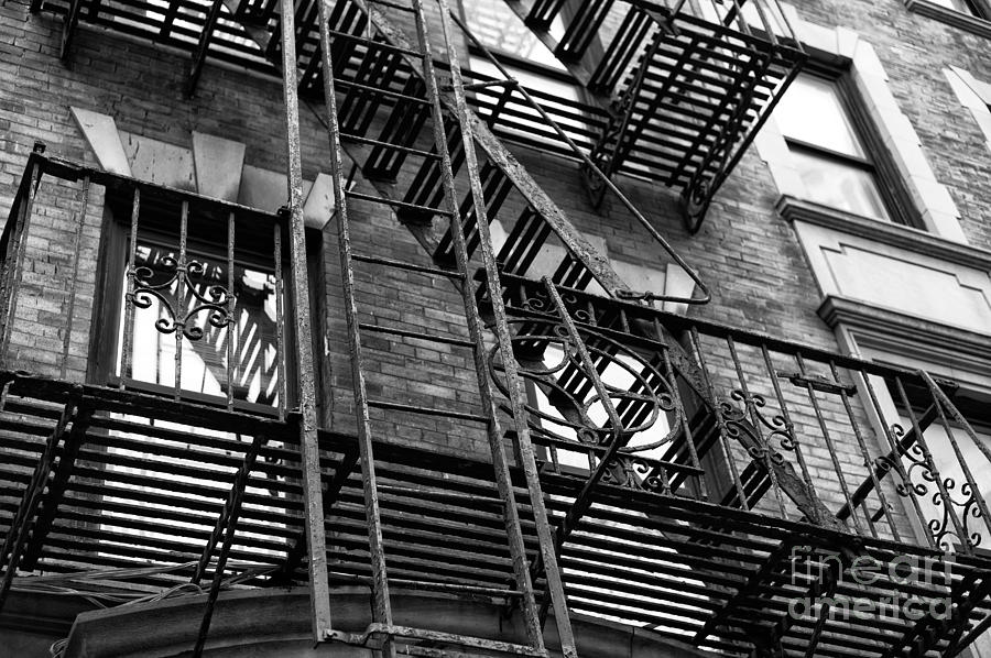 Wrought Iron Fire Escape in the Village Photograph by John Rizzuto