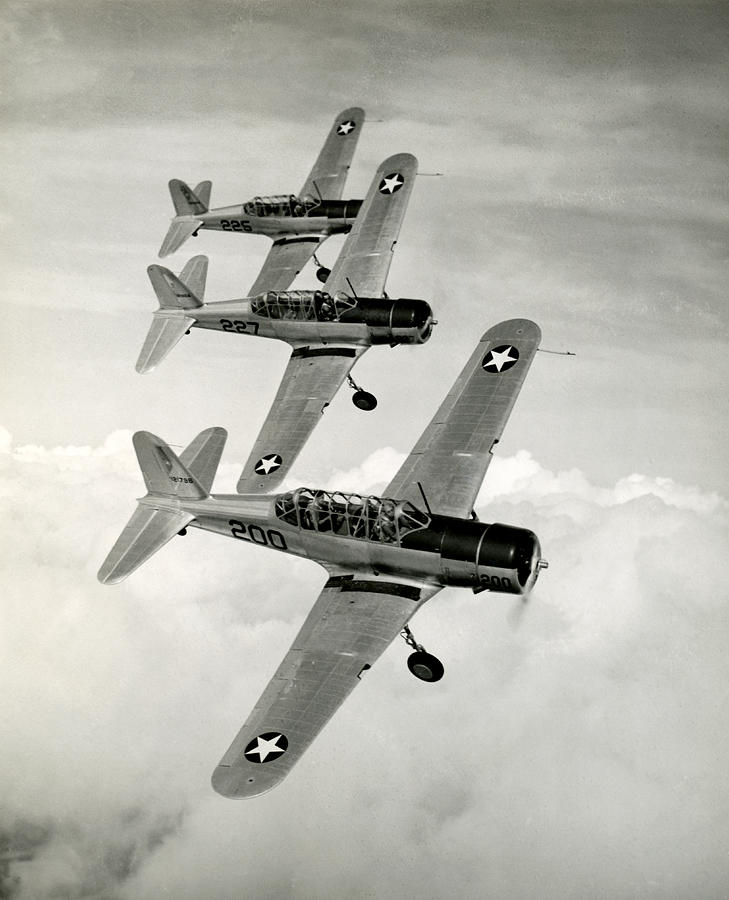Black And White Photograph - WWII Vultee Valiant Aircraft in Flight by Historic Image