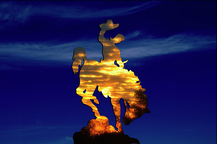 Wyoming Sunset On The Cowboy And His Bucking Bronco Photograph by Thomas Woolworth