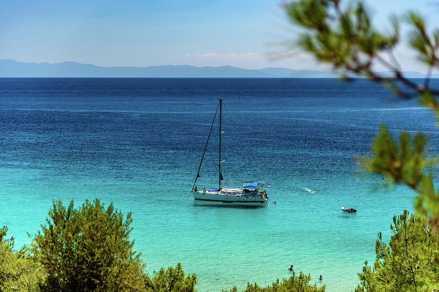 Yacht In A Greek Bay With Crystal Clear Water Photograph By Todor