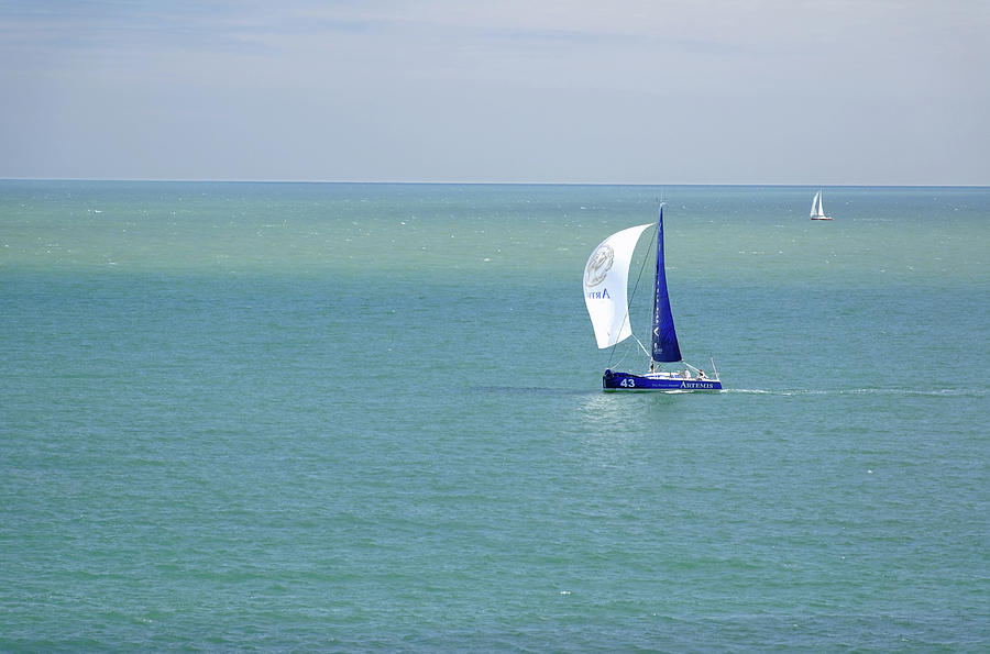Yachts Sailing in Ventnor Bay Photograph by Rod Johnson
