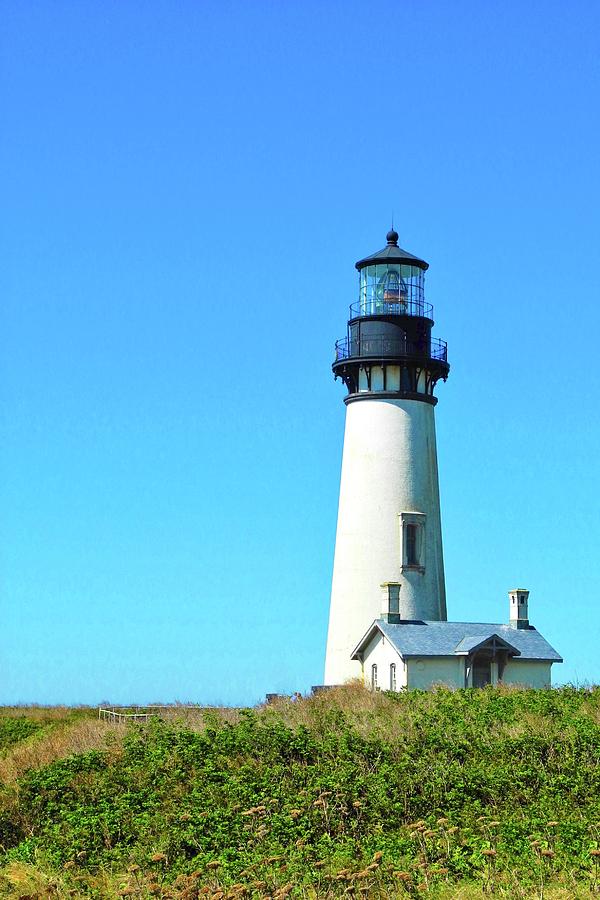 Yaquina Head Lighthouse in Newport Photograph by Kirsten Giving