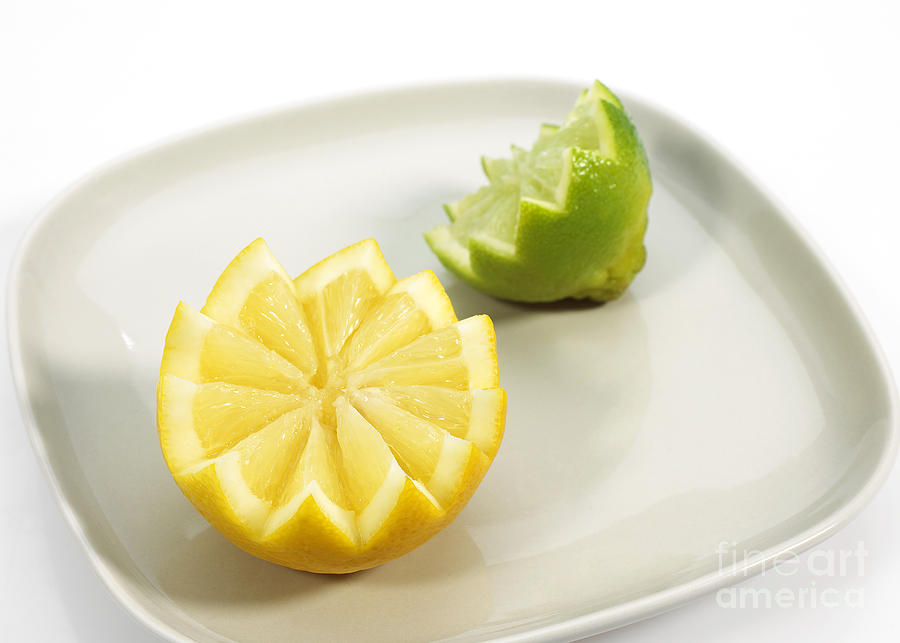 Yellow And Green Lemons Photograph by Gerard Lacz
