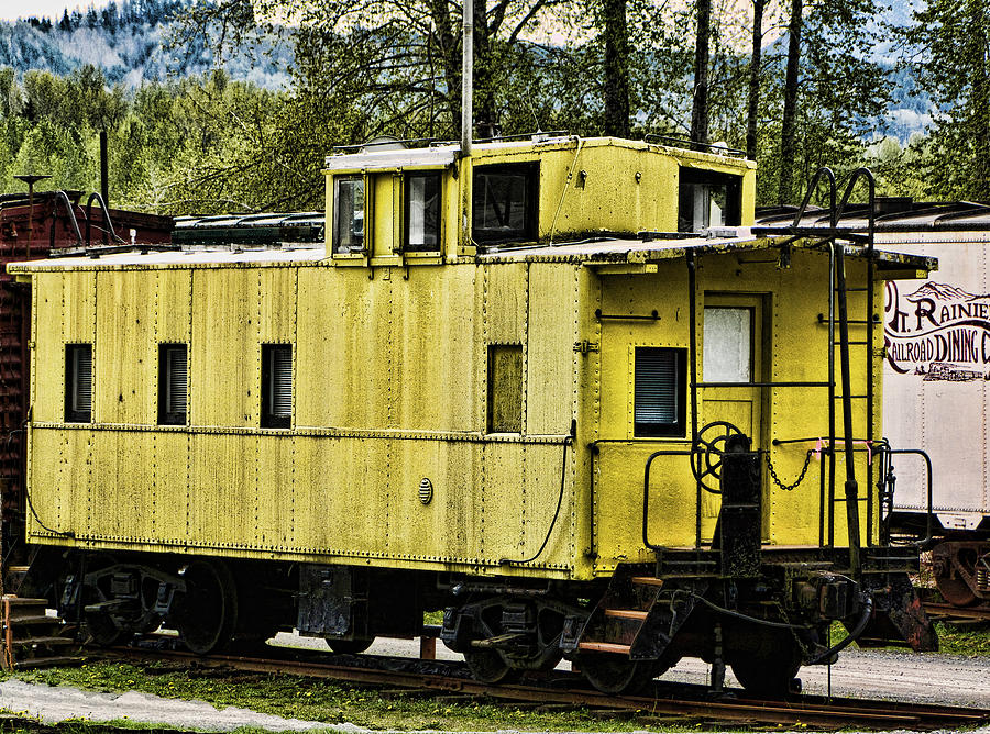 Yellow Caboose Photograph by Ron Roberts
