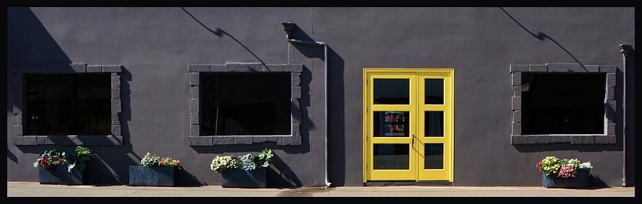 Yellow Door on Dark Wall Photograph by Josephine Buschman