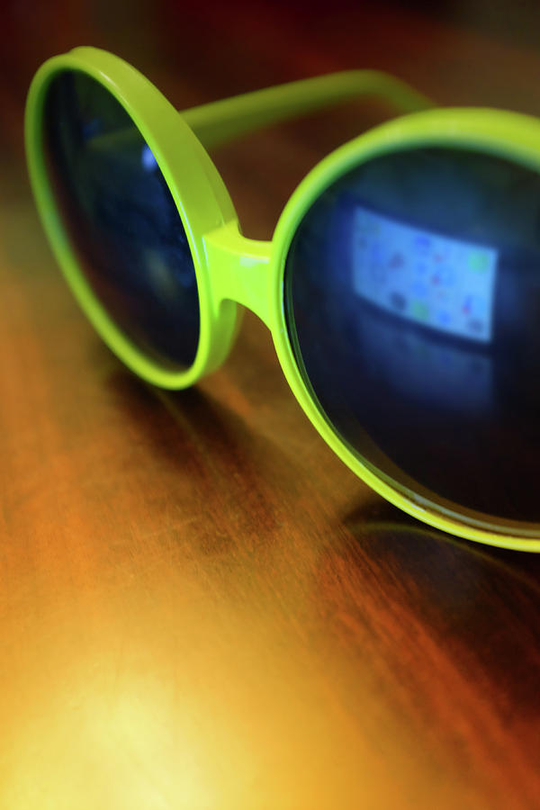 Yellow Goggles With Reflection Photograph by Carlos Caetano