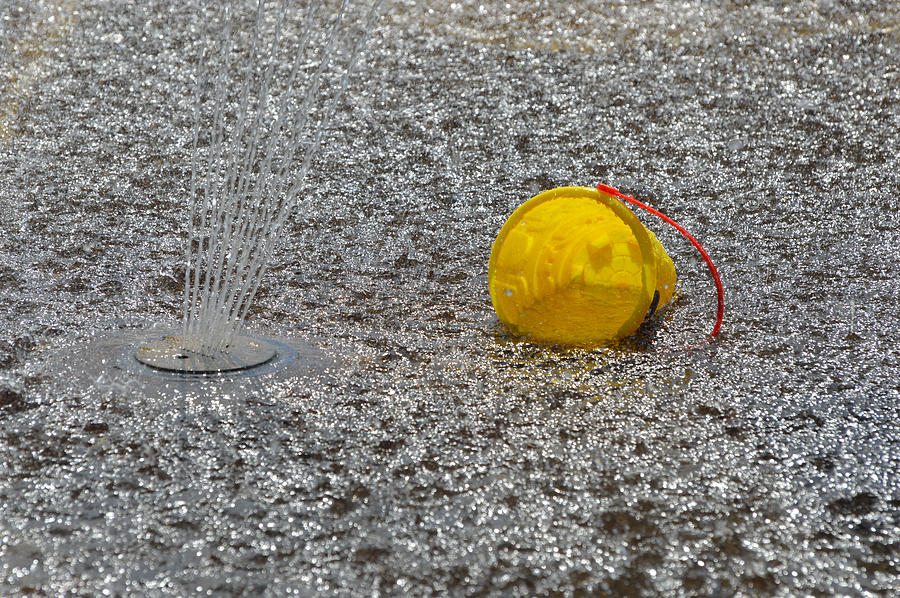 Yellow Pail And Water  Photograph by Lyle Crump
