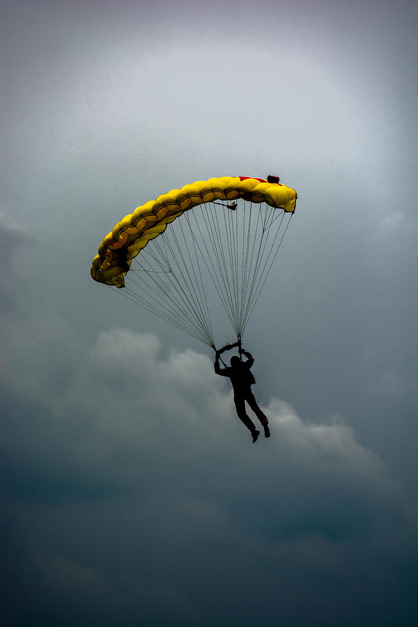 Yellow Parachute Over The Clouds Photograph by Andreas Berthold