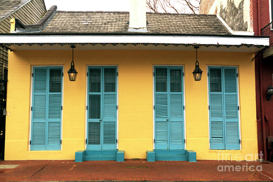 Yellow Row House in New Orleans Photograph by John Rizzuto