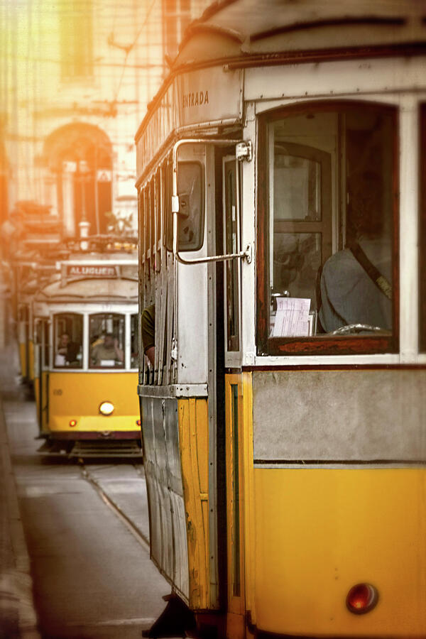 Yellow Trams of Lisbon Portugal  Photograph by Carol Japp