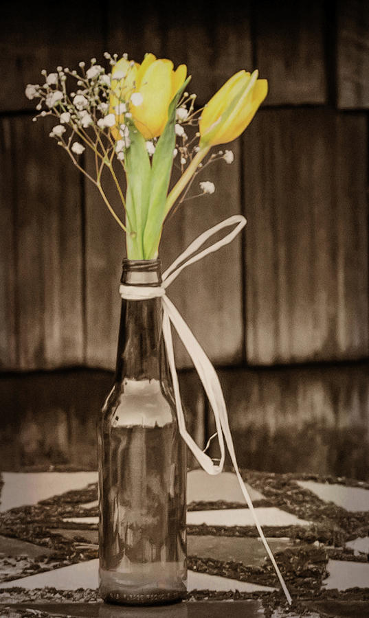 Yellow Tulips in Glass Bottle Sepia Photograph by Terry DeLuco