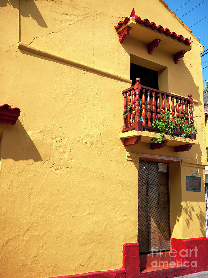 Yellow Wall in Cartagena Photograph by John Rizzuto