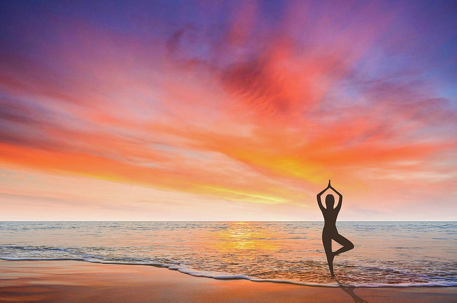 Yoga at sunset II Photograph by Paulo Goncalves