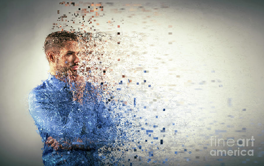 Young businessman dispersing into pixels. Photograph by Michal Bednarek