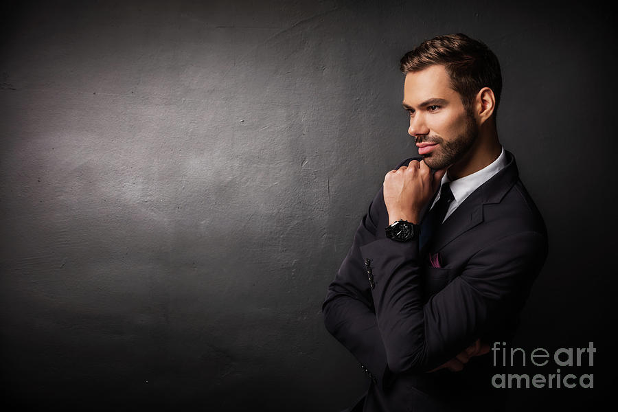 Young businessman thinking about new business ideas Photograph by Michal Bednarek