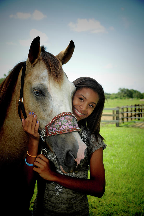 Young girl and her horse Photograph by Keith Lovejoy