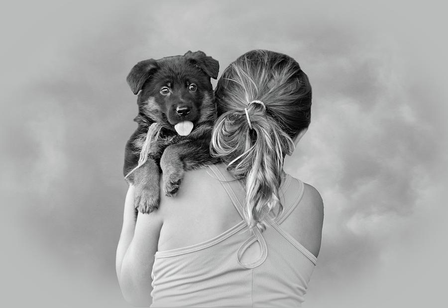 Young Girl and Puppy Photograph by Sandy Keeton
