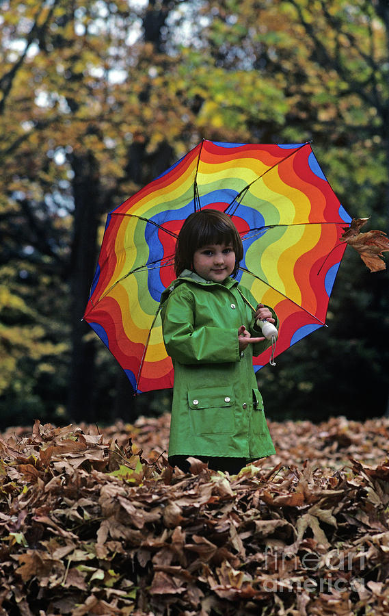 Young Girl Holding an Umbrella  Photograph by Jim Corwin