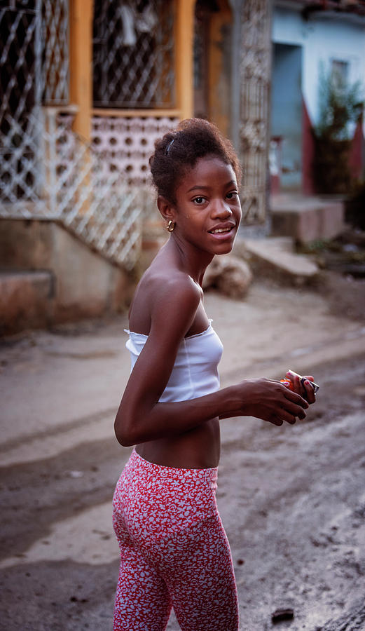 Young Girl in Trinidad Cuba Photograph by Joan Carroll