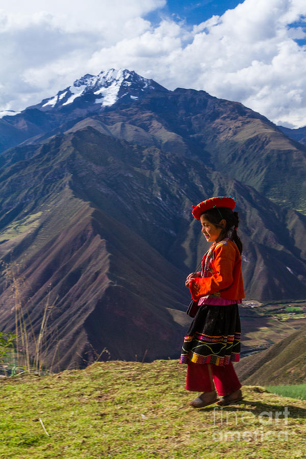 Young girl walking home in the Peruvian Andes Photograph by Dan Hartford
