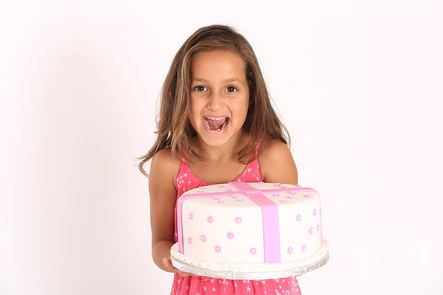Young girl with birthday cake Photograph by Fabian Koldorff