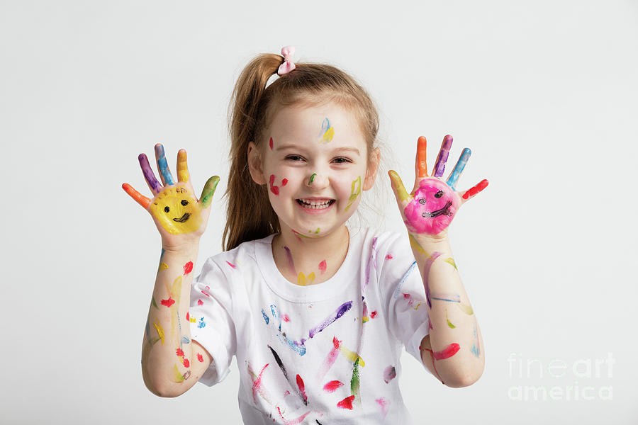 Young kid showing her colorful hands Photograph by Michal Bednarek