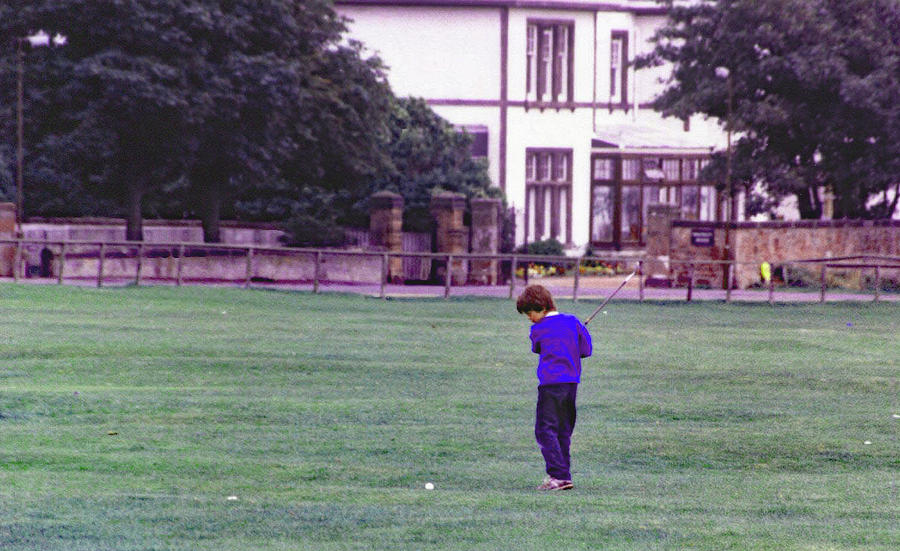 Young Lad Practicing on town Green Photograph by Imagery-at- Work