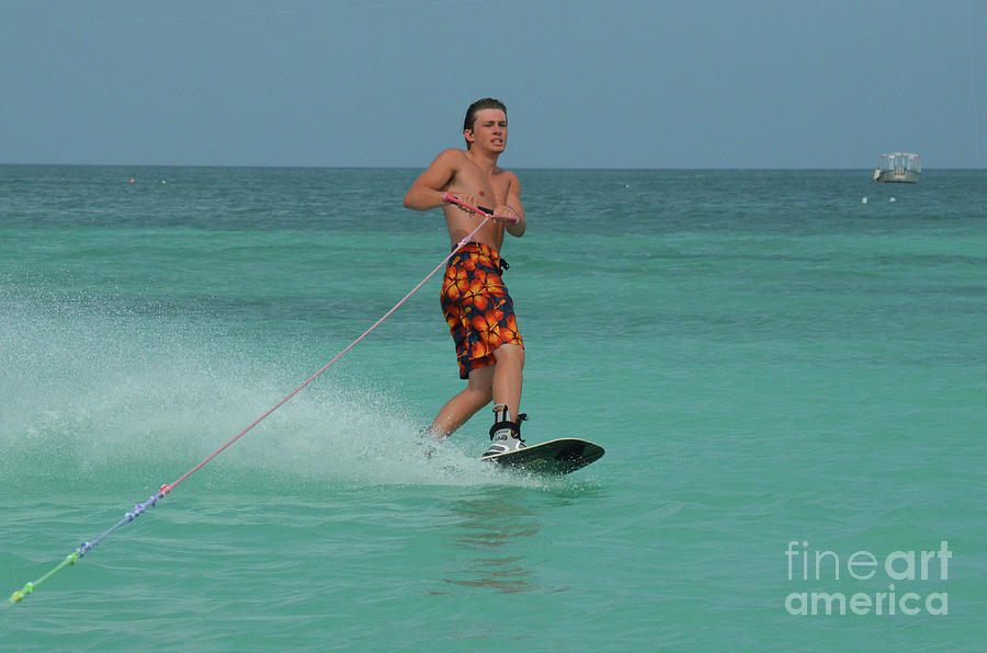 Young Man on a Wakeboard off the Coast of Aruba Photograph by DejaVu Designs