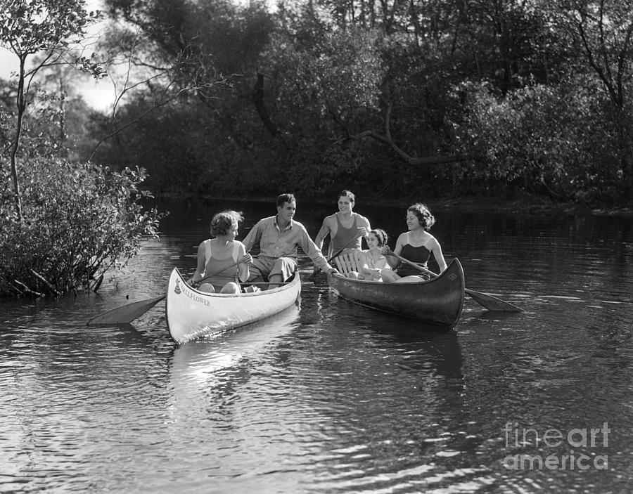 Young People Canoeing, C.1930s Photograph by H. Armstrong Roberts/ClassicStock