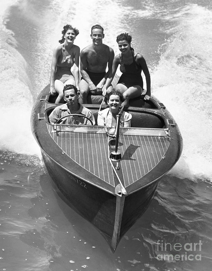 Young People In Motor Boat, C. 1930s Photograph by H. Armstrong Roberts/ClassicStock